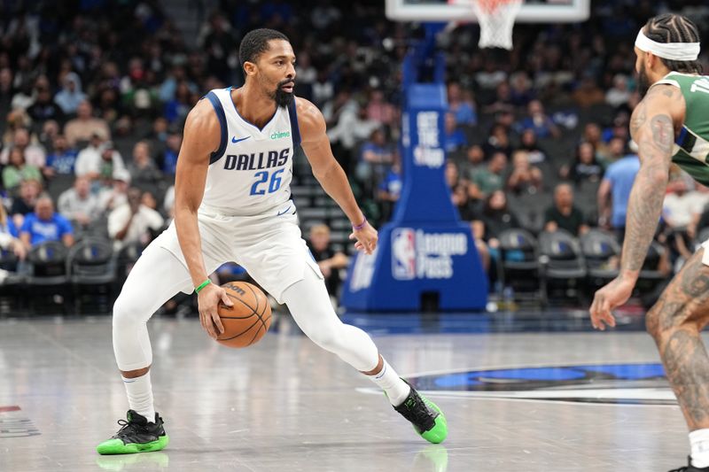 DALLAS, TX - OCTOBER 17: Spencer Dinwiddie #26 of the Dallas Mavericks dribbles the ball during the game against the Milwaukee Bucks during a NBA preseason game on October 17, 2024 at American Airlines Center in Dallas, Texas. NOTE TO USER: User expressly acknowledges and agrees that, by downloading and or using this photograph, User is consenting to the terms and conditions of the Getty Images License Agreement. Mandatory Copyright Notice: Copyright 2024 NBAE (Photo by Glenn James/NBAE via Getty Images)