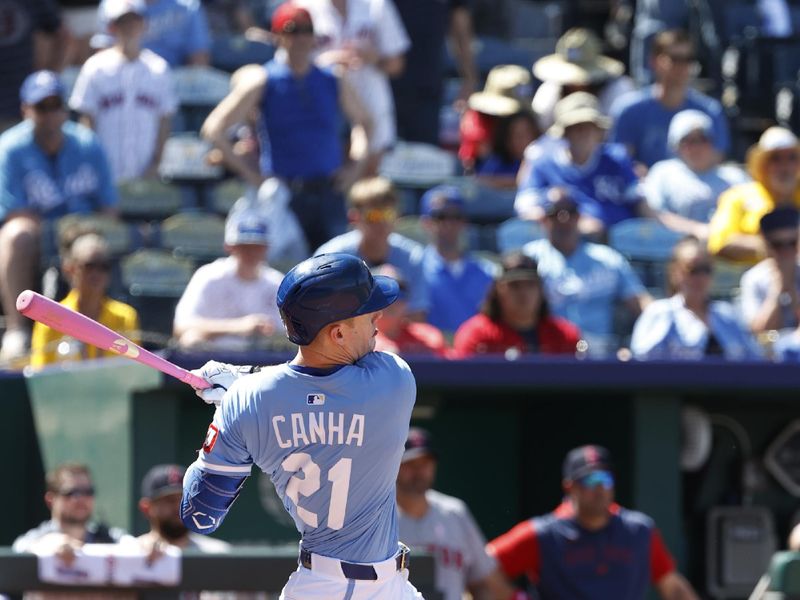 May 11, 2025; Kansas City, Missouri, USA; Kansas City Royals designated hitter Mark Canha (21) hits the ball at Kauffman Stadium. Mandatory Credit: Gary Rohman-Imagn Images