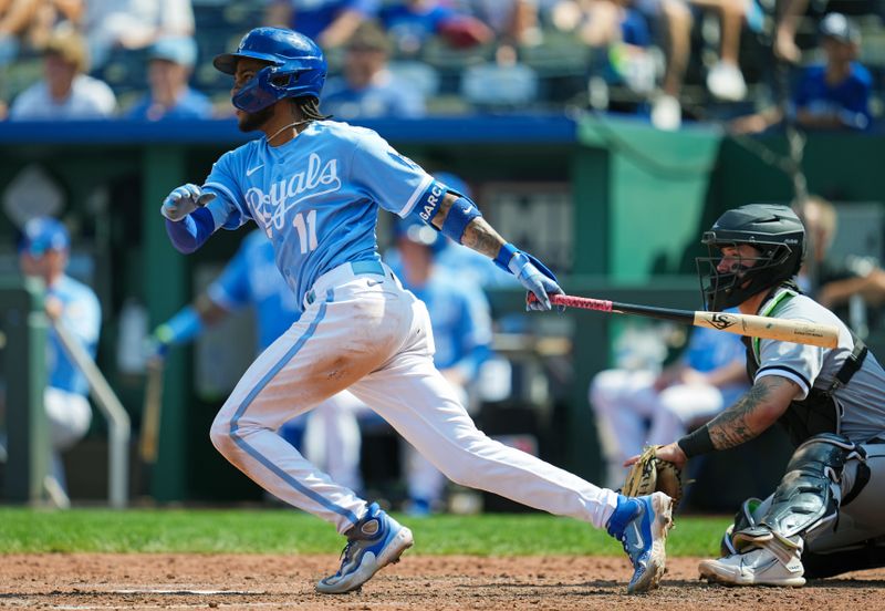 Sep 4, 2023; Kansas City, Missouri, USA; Kansas City Royals shortstop Maikel Garcia (11) hits an RBI double during the sixth inning against the Chicago White Sox at Kauffman Stadium. Mandatory Credit: Jay Biggerstaff-USA TODAY Sports