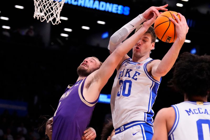 Mar 24, 2024; Brooklyn, NY, USA; Duke Blue Devils center Kyle Filipowski (30) gets a rebound over James Madison Dukes guard Noah Freidel (1) in the second round of the 2024 NCAA Tournament  at Barclays Center. Mandatory Credit: Robert Deutsch-USA TODAY Sports