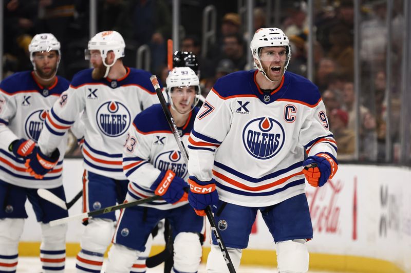 Dec 18, 2025; Boston, Massachusetts, USA; Edmonton Oilers center Connor McDavid (97) celebrates as he leads teammates back to the bench after scoring a shorthanded goal against the Boston Bruins during the third period at TD Garden. Mandatory Credit: Winslow Townson-Imagn Images