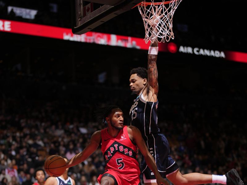 TORONTO, CANADA - FEBRUARY 28: Immanuel Quickley #5 of the Toronto Raptors passes the ball during the game against the Dallas Mavericks on February 28, 2024 at the Scotiabank Arena in Toronto, Ontario, Canada.  NOTE TO USER: User expressly acknowledges and agrees that, by downloading and or using this Photograph, user is consenting to the terms and conditions of the Getty Images License Agreement.  Mandatory Copyright Notice: Copyright 2024 NBAE (Photo by Mark Blinch/NBAE via Getty Images)