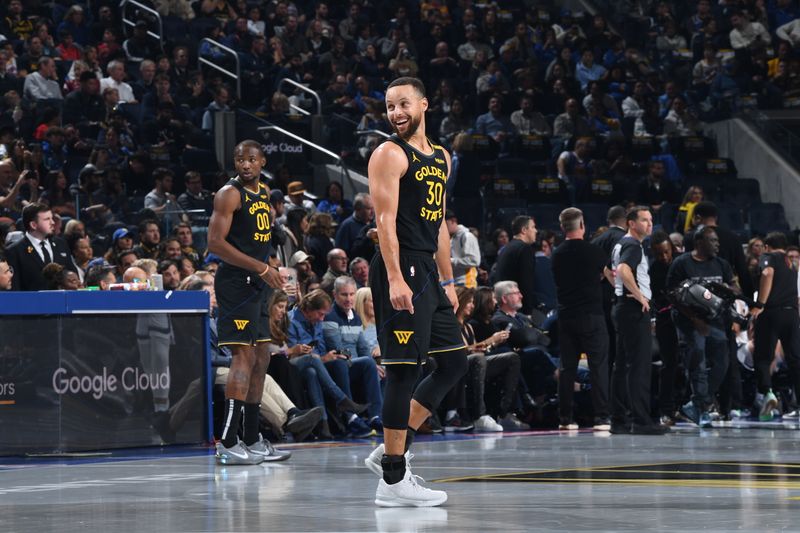 SAN FRANCISCO, CA - NOVEMBER 15: Stephen Curry #30 of the Golden State Warriors smiles during the game against the Memphis Grizzlies during the Emirates NBA Cup game on November 15, 2024 at Chase Center in San Francisco, California. NOTE TO USER: User expressly acknowledges and agrees that, by downloading and or using this photograph, user is consenting to the terms and conditions of Getty Images License Agreement. Mandatory Copyright Notice: Copyright 2024 NBAE (Photo by Noah Graham/NBAE via Getty Images)