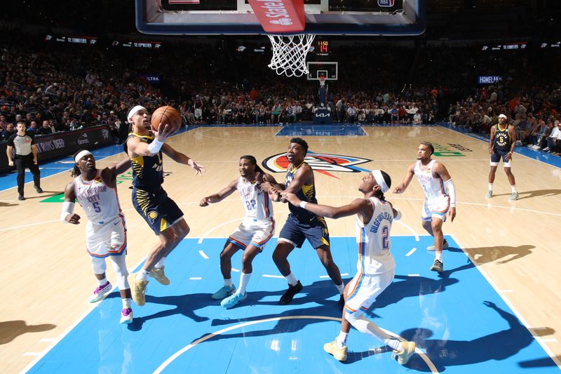 OKLAHOMA CITY, OK - MARCH 29: Andrew Nembhard #2 of the Indiana Pacers drives to the basket during the game against the Oklahoma City Thunder on March 29, 2025 at Paycom Center in Oklahoma City, Oklahoma. NOTE TO USER: User expressly acknowledges and agrees that, by downloading and or using this photograph, User is consenting to the terms and conditions of the Getty Images License Agreement. Mandatory Copyright Notice: Copyright 2025 NBAE (Photo by Zach Beeker/NBAE via Getty Images)