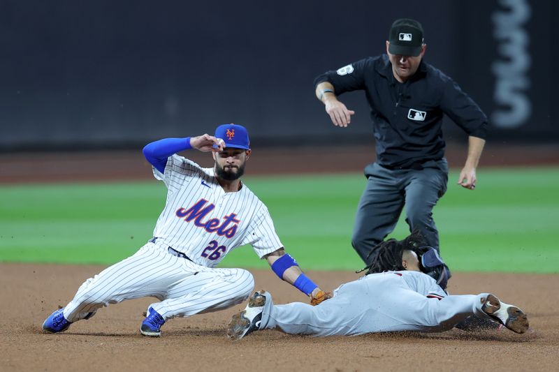 Sep 16, 2024; New York City, New York, USA; Washington Nationals third baseman Jose Tena (8) is tagged out trying to steal second base by New York Mets second baseman Eddy Alvarez (26) during the fourth inning at Citi Field. Mandatory Credit: Brad Penner-Imagn Images