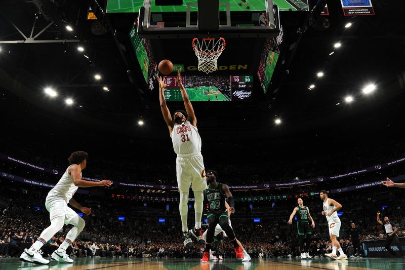 BOSTON, MA - NOVEMBER 19:   Jarrett Allen #31 of the Cleveland Cavaliers grabs the rebound during the game against the Boston Celtics during the Emirates NBA Cup game on November 19, 2024 at TD Garden in Boston, Massachusetts. NOTE TO USER: User expressly acknowledges and agrees that, by downloading and/or using this Photograph, user is consenting to the terms and conditions of the Getty Images License Agreement. Mandatory Copyright Notice: Copyright 2024 NBAE (Photo by Brian Babineau/NBAE via Getty Images)