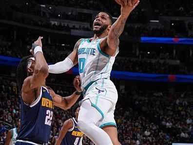 DENVER, CO - JANUARY 1: Miles Bridges #0 of the Charlotte Hornets drives to the basket during the game against the Denver Nuggets on January 1, 2024 at the Ball Arena in Denver, Colorado. NOTE TO USER: User expressly acknowledges and agrees that, by downloading and/or using this Photograph, user is consenting to the terms and conditions of the Getty Images License Agreement. Mandatory Copyright Notice: Copyright 2024 NBAE (Photo by Garrett Ellwood/NBAE via Getty Images)