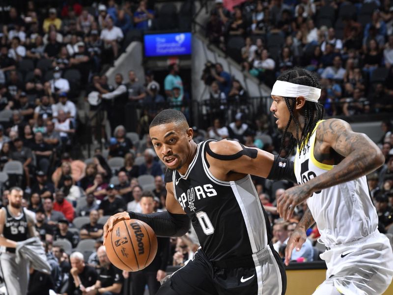 SAN ANTONIO, TX - NOVEMBER 9: Keldon Johnson #0 of the San Antonio Spurs dribbles the ball during the game against the Utah Jazz on November 9, 2024 at the Frost Bank Center in San Antonio, Texas. NOTE TO USER: User expressly acknowledges and agrees that, by downloading and or using this photograph, user is consenting to the terms and conditions of the Getty Images License Agreement. Mandatory Copyright Notice: Copyright 2024 NBAE (Photos by Logan Riely/NBAE via Getty Images)