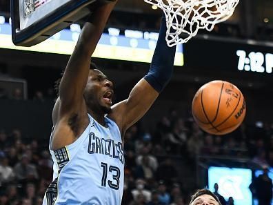 SALT LAKE CITY, UTAH - NOVEMBER 01: Jaren Jackson Jr. #13 of the Memphis Grizzlies dunks over Walker Kessler #24 of the Utah Jazz during the first half of a game at Delta Center on November 01, 2023 in Salt Lake City, Utah. NOTE TO USER: User expressly acknowledges and agrees that, by downloading and or using this photograph, User is consenting to the terms and conditions of the Getty Images License Agreement. (Photo by Alex Goodlett/Getty Images)