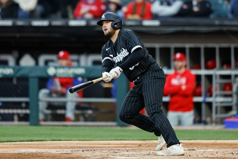 Apr 18, 2023; Chicago, Illinois, USA; Chicago White Sox first baseman Jake Burger (30) hits a three-run home run against the Philadelphia Phillies during the first inning of game two of the doubleheader at Guaranteed Rate Field. Mandatory Credit: Kamil Krzaczynski-USA TODAY Sports