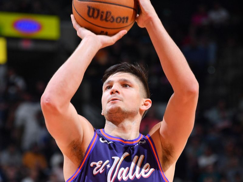 SAN ANTONIO, TX - MARCH 25: Grayson Allen #8 of the Phoenix Suns shoots a free throw during the game against the San Antonio Spurs on March 25, 2024 at the Frost Bank Center in San Antonio, Texas. NOTE TO USER: User expressly acknowledges and agrees that, by downloading and or using this photograph, user is consenting to the terms and conditions of the Getty Images License Agreement. Mandatory Copyright Notice: Copyright 2024 NBAE (Photos by Michael Gonzales/NBAE via Getty Images)