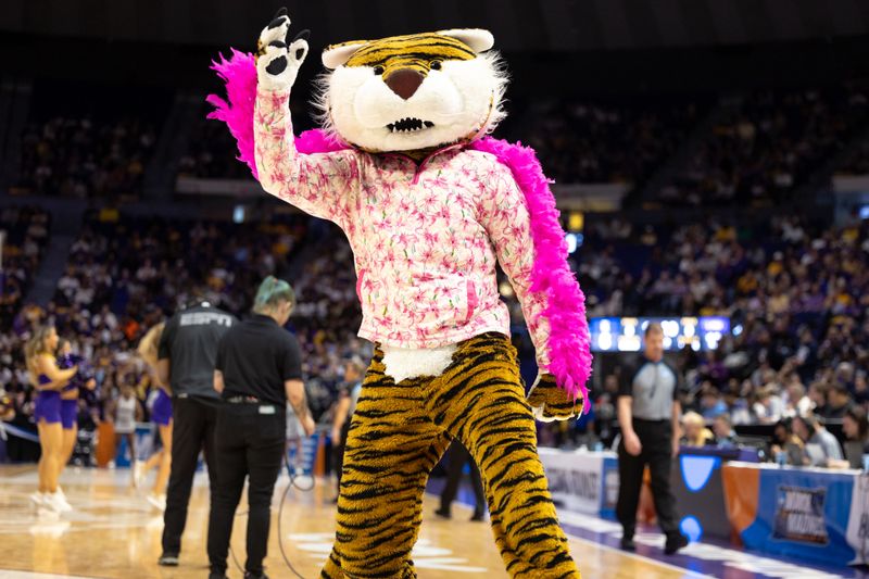 Mar 22, 2024; Baton Rouge, Louisiana, USA;  LSU Lady Tigers mascot Mike the Tiger performs against the Rice Owls during the first half at Pete Maravich Assembly Center. Mandatory Credit: Stephen Lew-USA TODAY Sports