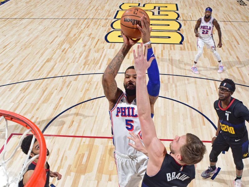 DENVER, CO - JANUARY 27: Marcus Morris Sr. #5 of the Philadelphia 76ers shoots the ball during the game against the Denver Nuggets on January 27, 2024 at the Ball Arena in Denver, Colorado. NOTE TO USER: User expressly acknowledges and agrees that, by downloading and/or using this Photograph, user is consenting to the terms and conditions of the Getty Images License Agreement. Mandatory Copyright Notice: Copyright 2024 NBAE (Photo by Garrett Ellwood/NBAE via Getty Images)