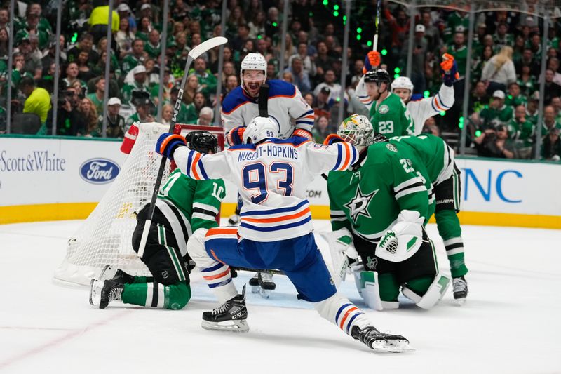 May 31, 2024; Dallas, Texas, USA; Edmonton Oilers center Ryan Nugent-Hopkins (93) celebrate after scoring a goal against the Dallas Stars during the first period between the Dallas Stars and the Edmonton Oilers in game five of the Western Conference Final of the 2024 Stanley Cup Playoffs at American Airlines Center. Mandatory Credit: Chris Jones-USA TODAY Sports