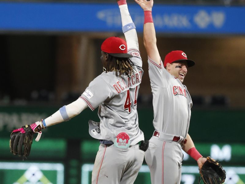 Aug 13, 2023; Pittsburgh, PA, USA; Cincinnati Reds shortstop Elly De La Cruz (44) and outfielder Spencer Steer (right) celebrate after defeating the Pittsburgh Pirates at PNC Park. The Reds won 6-5 in ten innings. Mandatory Credit: Charles LeClaire-USA TODAY Sports