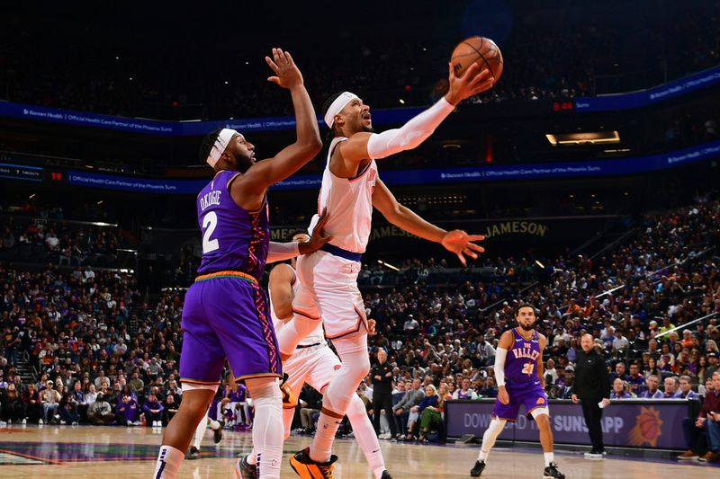 PHOENIX, AZ - NOVEMBER 20: Josh Hart #3 of the New York Knicks drives to the basket during the game against the Phoenix Suns on November 20, 2024 at Footprint Center in Phoenix, Arizona. NOTE TO USER: User expressly acknowledges and agrees that, by downloading and or using this photograph, user is consenting to the terms and conditions of the Getty Images License Agreement. Mandatory Copyright Notice: Copyright 2024 NBAE (Photo by Kate Frese/NBAE via Getty Images)