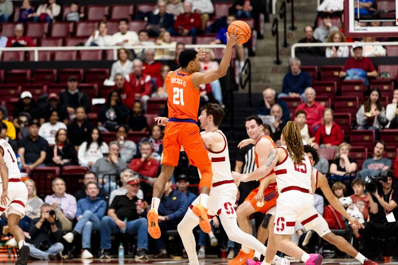 Feb 4, 2026; Stanford, California, USA;  Clemson Tigers guard Ace Buckner (21) passes against the Stanford Cardinal during the first half at Maples Pavilion. Mandatory Credit: John Hefti-Imagn Images