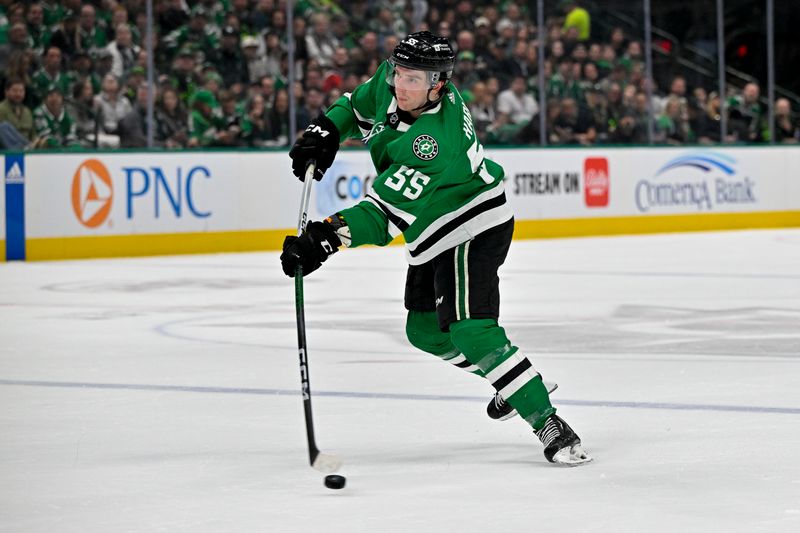 Mar 12, 2024; Dallas, Texas, USA; Dallas Stars defenseman Thomas Harley (55) shoots the puck on the Florida Panthers net during the second period at the American Airlines Center. Mandatory Credit: Jerome Miron-USA TODAY Sports