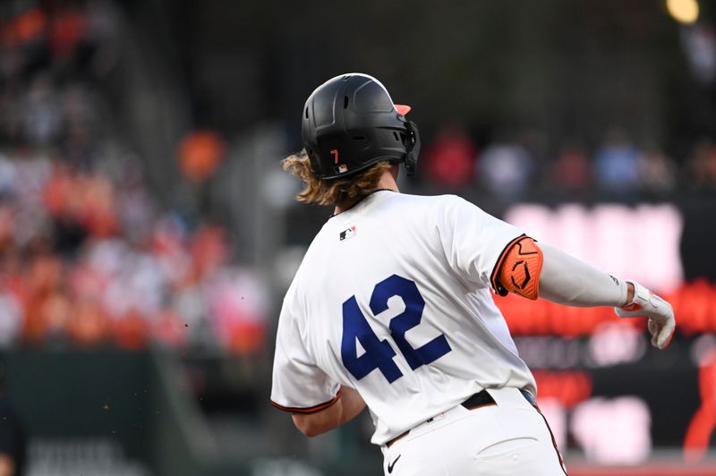 Apr 15, 2024; Baltimore, Maryland, USA;  Baltimore Orioles second baseman Jackson Holiday  runs out a second inning ground out against the Minnesota Twins at Oriole Park at Camden Yards. Mandatory Credit: Tommy Gilligan-USA TODAY Sports