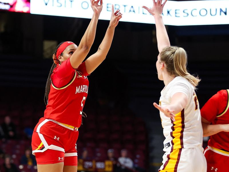 Jan 3, 2024; Minneapolis, Minnesota, USA; Maryland Terrapins guard Brinae Alexander (5) shoots as Minnesota Golden Gophers forward Mallory Heyer (24) defends during the second half at Williams Arena. Mandatory Credit: Matt Krohn-USA TODAY Sports