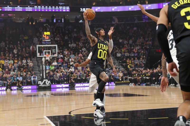 SALT LAKE CITY, UT - OCTOBER 31:  Jordan Clarkson #00 of the Utah Jazz shoots the ball during the game on October 31, 2024 at Delta Center in Salt Lake City, Utah. NOTE TO USER: User expressly acknowledges and agrees that, by downloading and or using this Photograph, User is consenting to the terms and conditions of the Getty Images License Agreement. Mandatory Copyright Notice: Copyright 2024 NBAE (Photo by Chris Nicoll/NBAE via Getty Images)