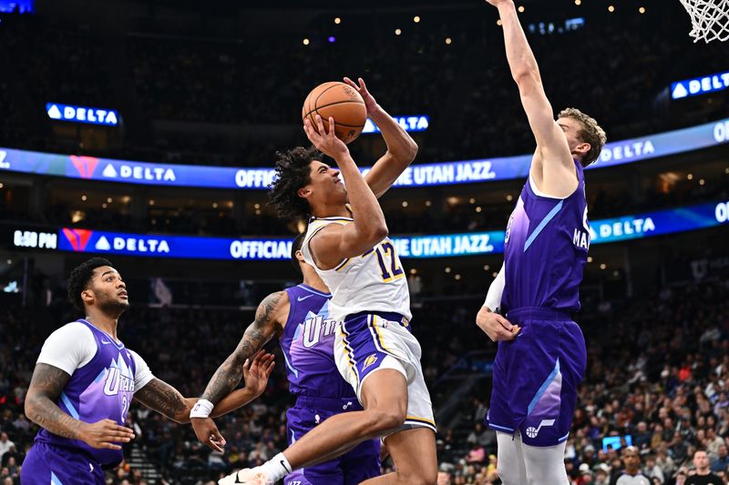 SALT LAKE CITY, UT - DECEMBER 1: Max Christie #12 of the Los Angeles Lakers drives to the basket during the game against the Utah Jazz on December 1, 2024 at Delta Center in Salt Lake City, Utah. NOTE TO USER: User expressly acknowledges and agrees that, by downloading and or using this Photograph, User is consenting to the terms and conditions of the Getty Images License Agreement. Mandatory Copyright Notice: Copyright 2024 NBAE (Photo by Jamie Sabau/NBAE via Getty Images)