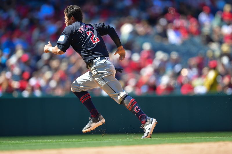 May 26, 2024; Anaheim, California, USA; Cleveland Guardians outfielder Tyler Freeman (2) runs to third after stealing second against the Los Angeles Angels at Angel Stadium. Mandatory Credit: Gary A. Vasquez-USA TODAY Sports