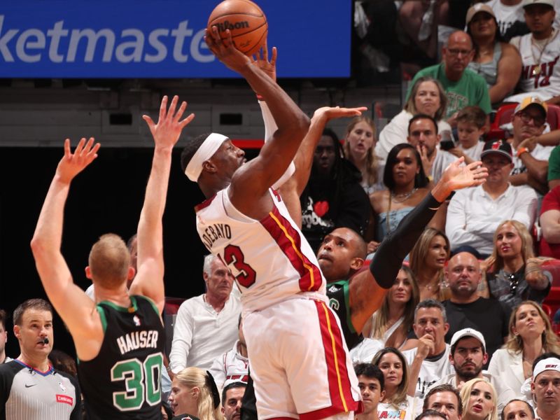 MIAMI, FL - APRIL 27: Bam Adebayo #13 of the Miami Heat shoots the ball during the game against the Boston Celtics during Round 1 Game 3 of the 2024 NBA Playoffs on April 27, 2024 at Kaseya Center in Miami, Florida. NOTE TO USER: User expressly acknowledges and agrees that, by downloading and or using this Photograph, user is consenting to the terms and conditions of the Getty Images License Agreement. Mandatory Copyright Notice: Copyright 2024 NBAE (Photo by Issac Baldizon/NBAE via Getty Images)