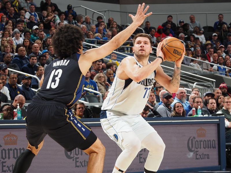 INDIANAPOLIS, IN - MARCH 27: Luka Doncic #77 of the Dallas Mavericks shoots the ball during the game against the Indiana Pacers on March 27, 2023 at Gainbridge Fieldhouse in Indianapolis, Indiana. NOTE TO USER: User expressly acknowledges and agrees that, by downloading and or using this Photograph, user is consenting to the terms and conditions of the Getty Images License Agreement. Mandatory Copyright Notice: Copyright 2023 NBAE (Photo by Ron Hoskins/NBAE via Getty Images)