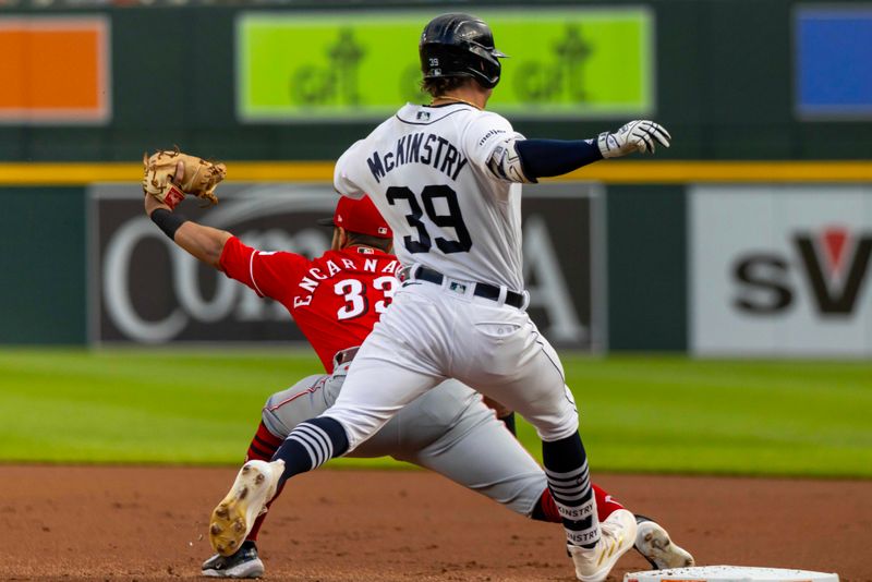 Sep 13, 2023; Detroit, Michigan, USA; Detroit Tigers right fielder Zach McKinstry (39) is out at first base as Cincinnati Reds first baseman Christian Encarnacion-Strand (33) catches the ball in the first inning at Comerica Park. Mandatory Credit: David Reginek-USA TODAY Sports