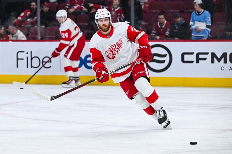 Dec 2, 2023; Montreal, Quebec, CAN; Detroit Red Wings left wing J.T. Compher (37) skates during warm up before the game against the Montreal Canadiens at Bell Centre. Mandatory Credit: David Kirouac-USA TODAY Sports