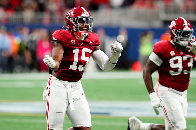 Dec 2, 2023; Atlanta, GA, USA; Alabama Crimson Tide linebacker Dallas Turner (15) celebrates after a sack in the second quarter against the Georgia Bulldogs in the SEC Championship at Mercedes-Benz Stadium. Mandatory Credit: John David Mercer-USA TODAY Sports