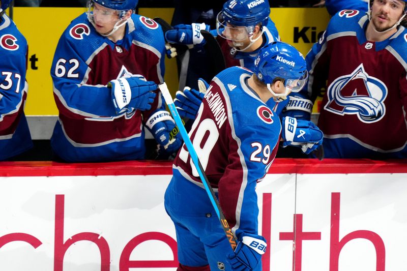 Mar 26, 2024; Denver, Colorado, USA; Colorado Avalanche center Nathan MacKinnon (29) celebrates his goal in the first period at Ball Arena. Mandatory Credit: Ron Chenoy-USA TODAY Sports