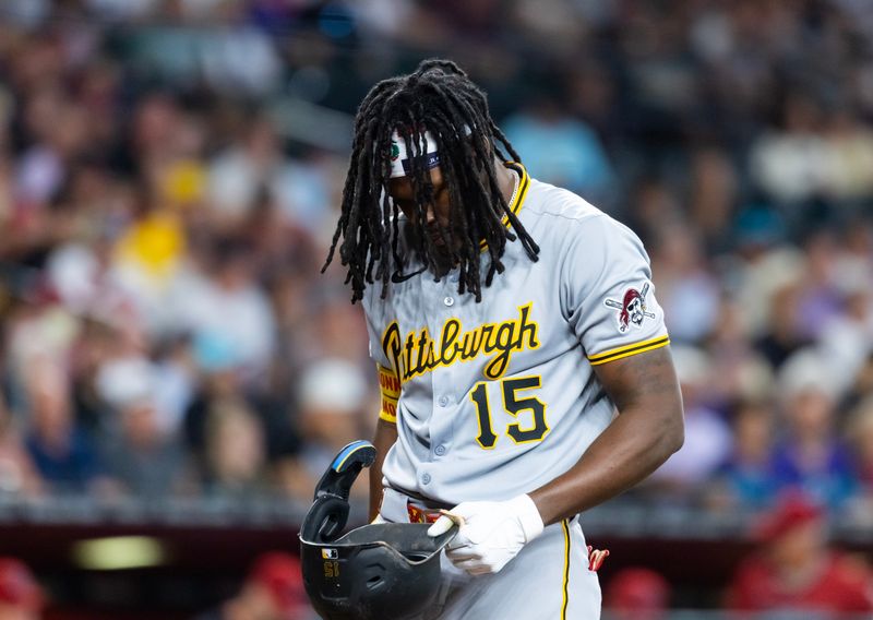 May 28, 2025; Phoenix, Arizona, USA; Pittsburgh Pirates outfielder Oneil Cruz reacts against the Arizona Diamondbacks at Chase Field. Mandatory Credit: Mark J. Rebilas-Imagn Images
