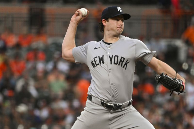 Jul 12, 2024; Baltimore, Maryland, USA;  New York Yankees pitcher Gerrit Cole (45) throws a second inning pitch against the Baltimore Orioles at Oriole Park at Camden Yards. Mandatory Credit: Tommy Gilligan-USA TODAY Sports