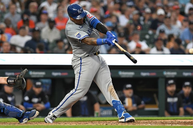 Aug 2, 2024; Detroit, Michigan, USA;  Kansas City Royals first baseman Salvador Perez (13) hits a double against the Detroit Tigers in the seventh inning at Comerica Park.  Mandatory Credit: Lon Horwedel-USA TODAY Sports