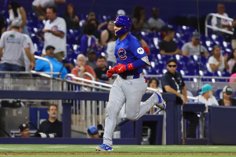 Aug 23, 2024; Miami, Florida, USA; Chicago Cubs catcher Miguel Amaya (9) runs past third base after hitting a two-run home run against the Miami Marlins during the ninth inning at loanDepot Park. Mandatory Credit: Sam Navarro-USA TODAY Sports