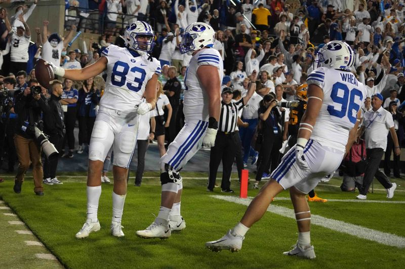 Sep 18, 2021; Provo, Utah, USA; BYU Cougars tight end Isaac Rex (83) celebrates with teammates after scoring on a 3-yard touchdown reception in the fourth quarter against the Arizona State Sun Devils at LaVell Edwards Stadium. Mandatory Credit: Kirby Lee-USA TODAY Sports