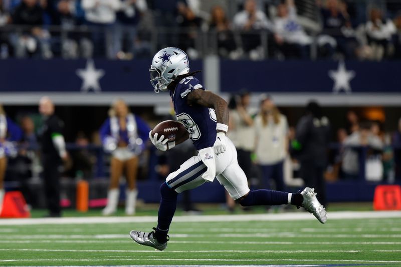 Dallas Cowboys wide receiver CeeDee Lamb (88) carries the ball after a reception during an NFL football game against the Detroit Lions, Saturday, Dec. 30, 2023, in Arlington, Texas. (AP Photo/Matt Patterson)