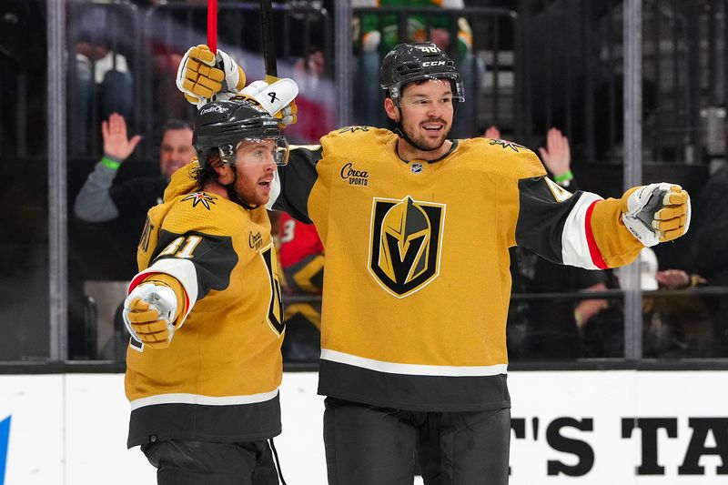 Apr 12, 2024; Las Vegas, Nevada, USA; Vegas Golden Knights right wing Jonathan Marchessault (81) celebrates with Vegas Golden Knights center Tomas Hertl (48) after scoring a goal against the Minnesota Wild during the second period at T-Mobile Arena. Mandatory Credit: Stephen R. Sylvanie-USA TODAY Sports