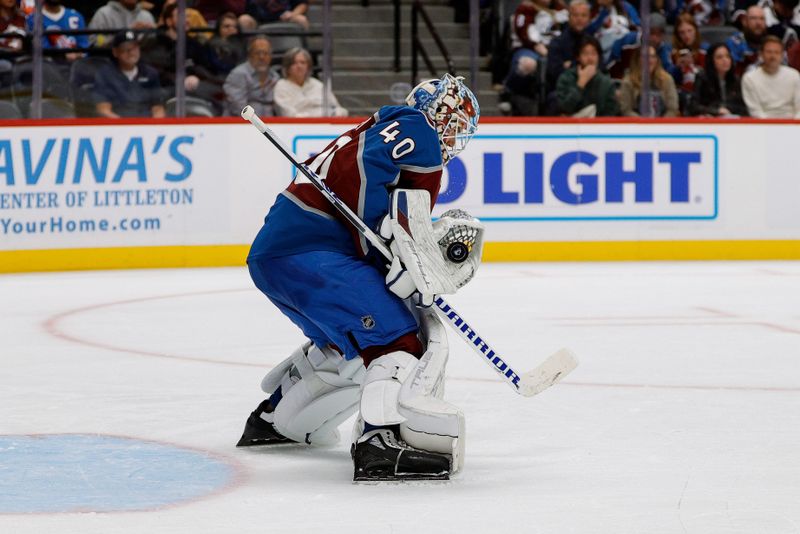 Oct 14, 2024; Denver, Colorado, USA; Colorado Avalanche goaltender Alexandar Georgiev (40) makes a save in the third period against the New York Islanders at Ball Arena. Mandatory Credit: Isaiah J. Downing-Imagn Images