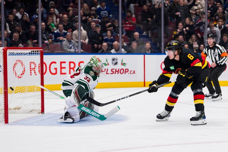 Dec 7, 2023; Vancouver, British Columbia, CAN; Vancouver Canucks forward Brock Boeser (6) hits the post behind Minnesota Wild goalie Filip Gustavsson (32) on a breakaway shot attempt in the third period at Rogers Arena. Vancouver won 2-0. Mandatory Credit: Bob Frid-USA TODAY Sports