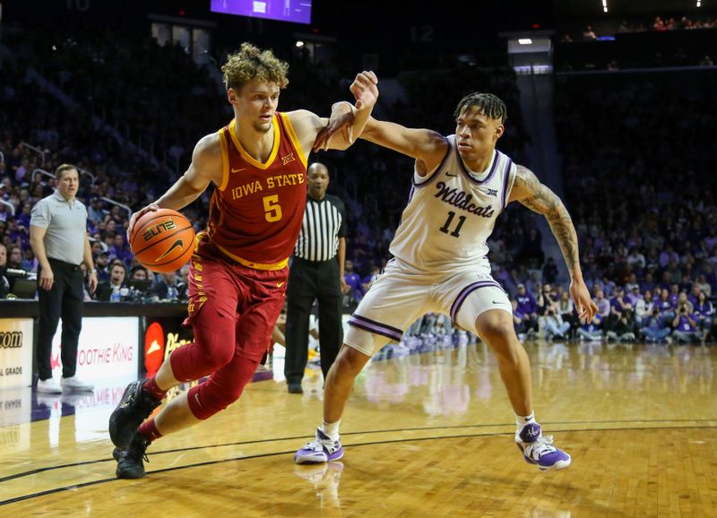 Feb 18, 2023; Manhattan, Kansas, USA; Iowa State Cyclones forward Alja   Kun   (5) dribbles against Kansas State Wildcats guard Keyontae Johnson (11) during the second half at Bramlage Coliseum. Mandatory Credit: Scott Sewell-USA TODAY Sports