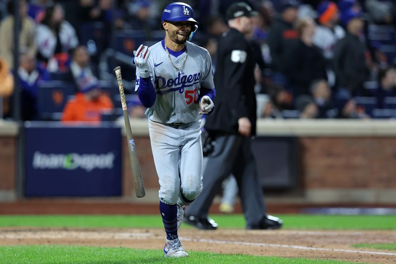 Oct 17, 2024; New York City, New York, USA; Los Angeles Dodgers shortstop Mookie Betts (50) reacts after hitting a two run home run against the New York Mets in the sixth inning during game four of the NLCS for the 2024 MLB playoffs at Citi Field. Mandatory Credit: Brad Penner-Imagn Images