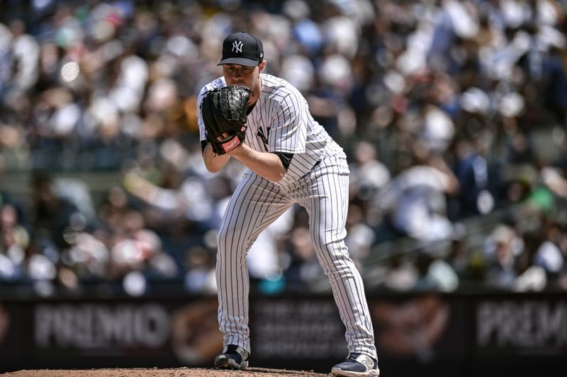 May 27, 2023; Bronx, New York, USA; New York Yankees relief pitcher Michael King (34) pitches against the San Diego Padres during the seventh inning at Yankee Stadium. Mandatory Credit: John Jones-USA TODAY Sports