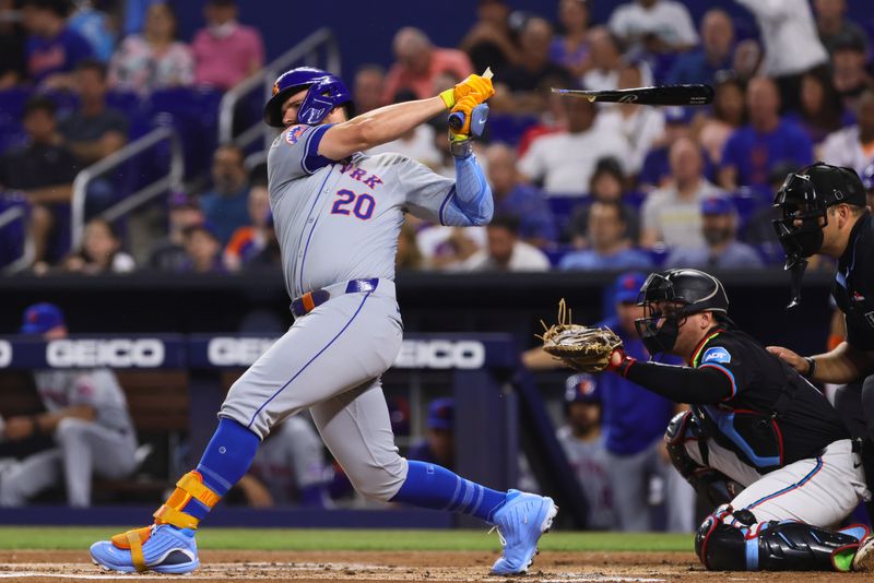 Jul 19, 2024; Miami, Florida, USA; New York Mets first baseman Pete Alonso (20) breaks his bat during his at-bat against the Miami Marlins in the first inning at loanDepot Park. Mandatory Credit: Sam Navarro-USA TODAY Sports