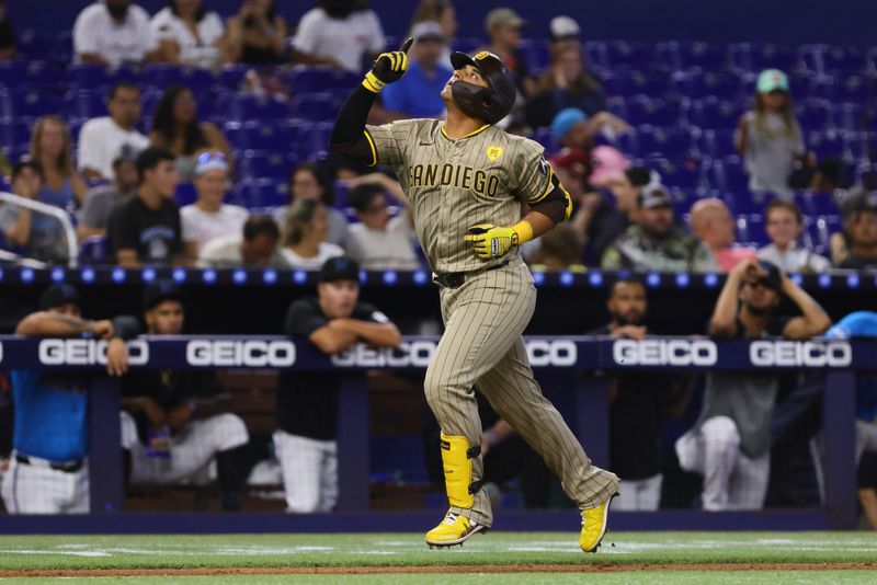 Aug 11, 2024; Miami, Florida, USA; San Diego Padres pinch-hitter Donovan Solano (39) circles the bases after hitting a two-run home run against the Miami Marlins during the eighth inning at loanDepot Park. Mandatory Credit: Sam Navarro-USA TODAY Sports