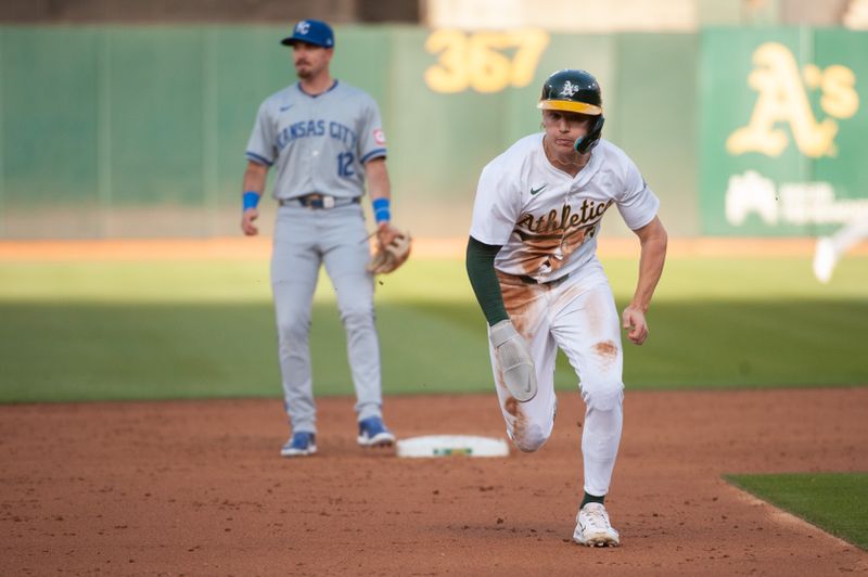 Jun 18, 2024; Oakland, California, USA; Oakland Athletics second base Zack Gelof (20) advances to third base during the third inning against the Kansas City Royals at Oakland-Alameda County Coliseum. Mandatory Credit: Ed Szczepanski-USA TODAY Sports