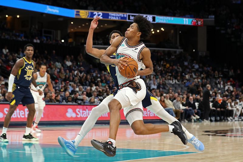 MEMPHIS, TENNESSEE - DECEMBER 01: Jaylen Wells #0 of the Memphis Grizzlies goes to the basket against Tyrese Haliburton #0 of the Indiana Pacers during the first half at FedExForum on December 01, 2024 in Memphis, Tennessee. NOTE TO USER: User expressly acknowledges and agrees that, by downloading and or using this photograph, User is consenting to the terms and conditions of the Getty Images License Agreement. (Photo by Justin Ford/Getty Images)