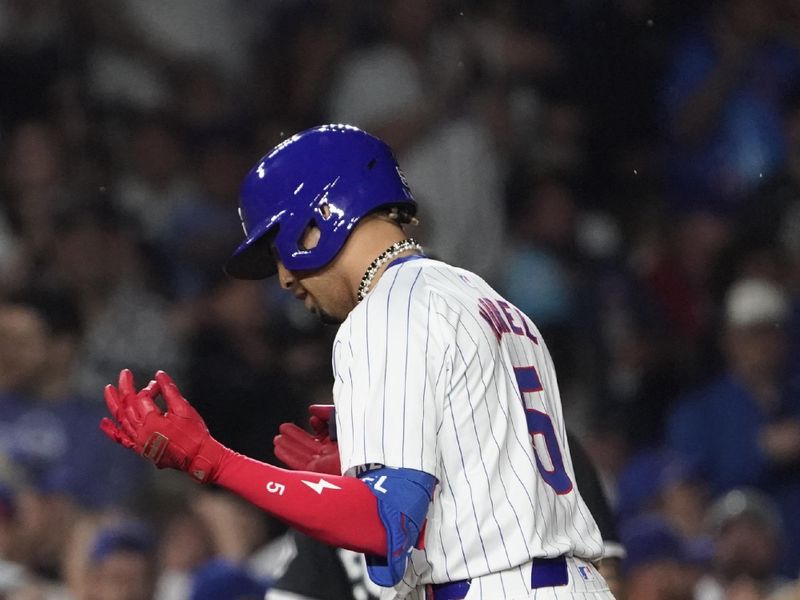 Jun 4, 2024; Chicago, Illinois, USA; Chicago Cubs third base Christopher Morel (5) runs the bases after hitting a two-run home run against the Chicago White Sox during the sixth inning at Wrigley Field. Mandatory Credit: David Banks-USA TODAY Sports